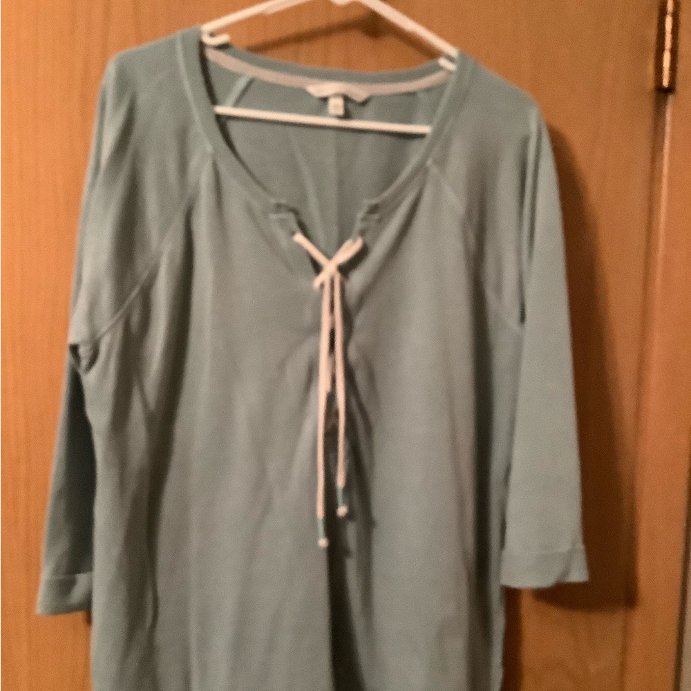 Womens casual top with lace up front. Size large